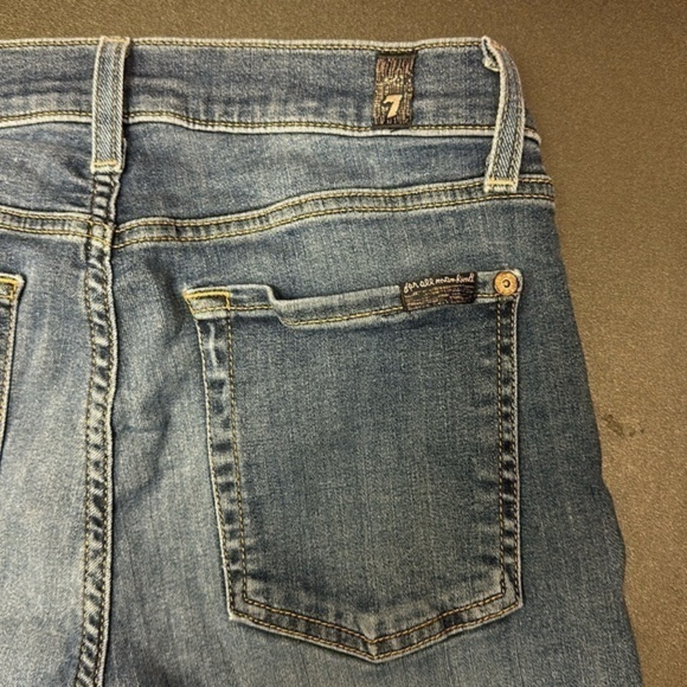 519.   Seven for all mankind size 27
